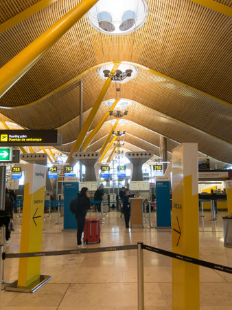Madrid, Spain - January 27, 2018: Interior of Barajas Airport in Madrid, Spain. Interior of Terminal 4, designed by Antonio Lamela and Richard Rogersのeditorial素材