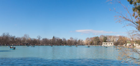 Madrid, Spain - January 27, 2018: Beautiful picture of tourists on boats at pond of the Parque del Buen Retiro - Park of the Pleasant Retreat in Madrid, Spainのeditorial素材