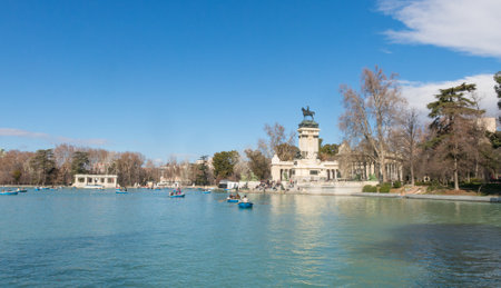 Madrid, Spain - January 27, 2018: People enjoying a boat ride on the pond in El Retiro Park in Madrid, Spain. El Retiro is the largest park of the city of Madrid. Spain.のeditorial素材
