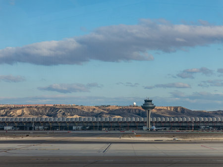 Madrid, Spain - January 27, 2018: A plane prepares to take off on the runway of Terminal T4 the Adolfo Suarez Madrid Barajas Airport. Barajas is the main international airport serving Madrid in Spain.のeditorial素材