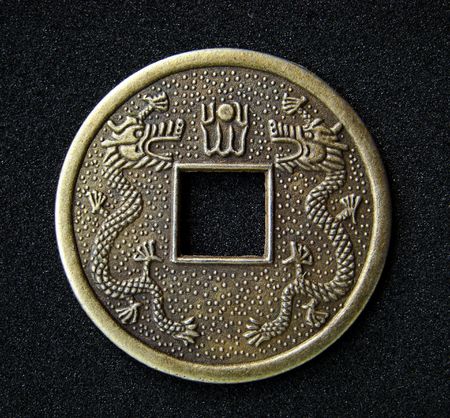 Close-up of chinese feng shui coin for good fortune and success.の写真素材
