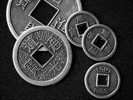 Chinese feng shui coins for good fortune and success in black and white.の写真素材