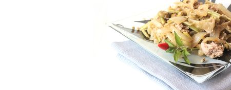 Asian style dish with vegetables and tuna fish - stir fry cooked - space for textの写真素材