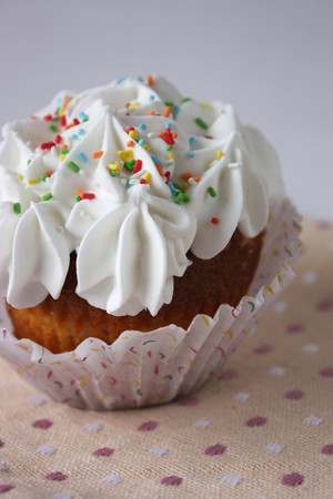 Cupcake over dotted napkinの写真素材