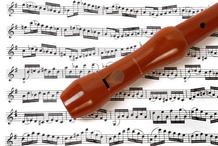 Flute on music sheetの写真素材