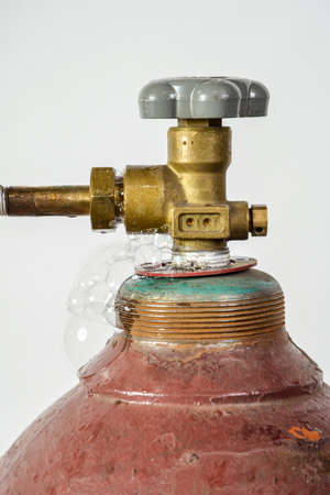 Gas cylinder for industrial welding with dial, valve and nozzle