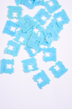 Price Tag Bread Clip on white background. The color of plastic tags on bread bag use to tell you which day of the week bread was baked on.の写真素材