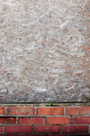 Compressed wood and brick grunge wallの写真素材