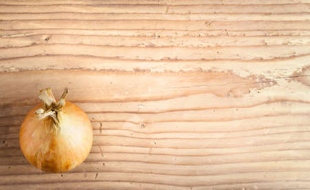 Onion on a old cutting board