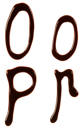Alphabet letters made from chocolate syrup are isolated on a white backgroundの写真素材