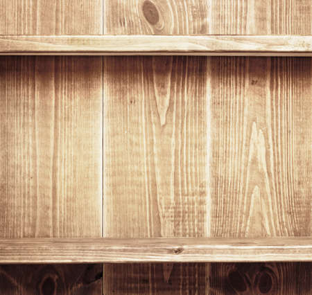 Empty shelf on wooden background. Wood texture.の写真素材