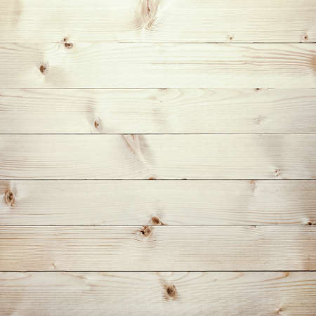 light wooden planks texture with branchの写真素材