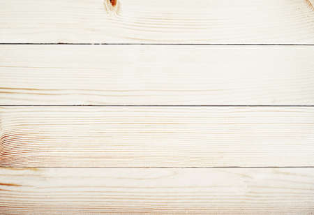 light wooden planks texture with branchの写真素材