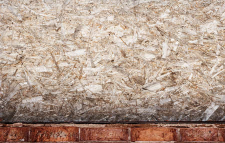 Compressed wood and brick grunge wallの写真素材