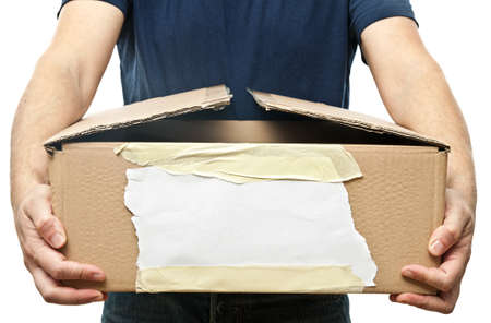 man holding old brown box