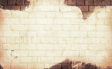 Old brick grunge painted wall backgroundの写真素材