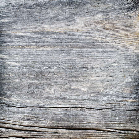 Old grey weathered wooden wallの写真素材