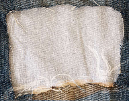 Blue torn jeans and fabric texture