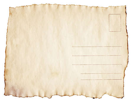 Vintage scorched postcard is isolated on white backgroundの写真素材