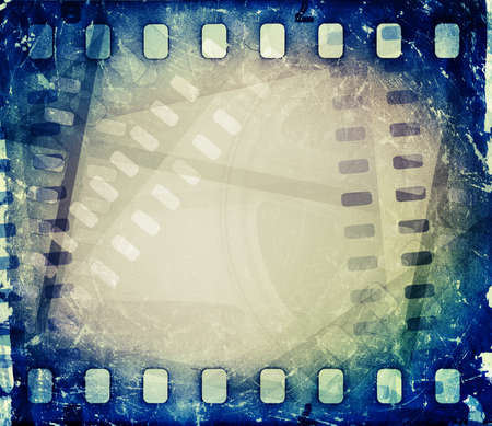 Old motion picture film reel with film strip  Vintage backgroundの写真素材