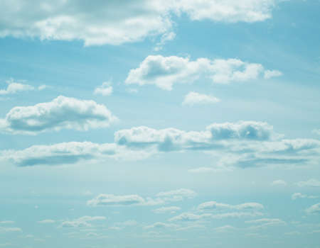 Blue sky, clouds and sun light. Summer time.
