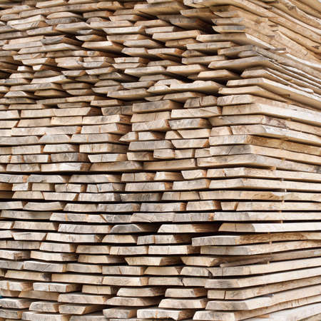 Stack of wood planks for construction buildings and furniture production 
