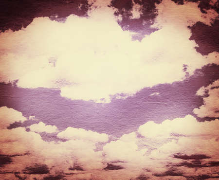 Cloud and sky on grainy paper.の写真素材