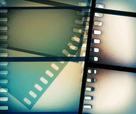 scratched film strip backgroundの写真素材