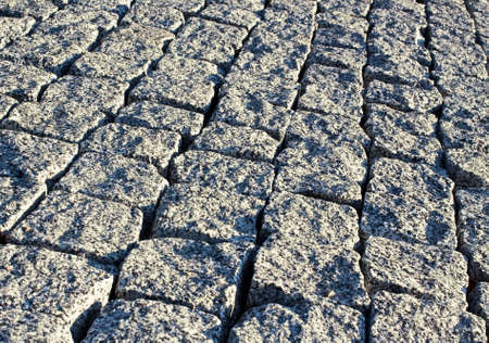 Vintage brick stone street road. Light pavement texture