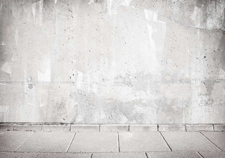 Light grey concrete wall texture with walkway.の写真素材