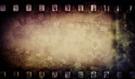Grunge old film strip with stars. Vintage backgroundの写真素材