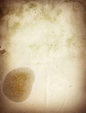 Light grunge brown recycled parchment with stains, paper texture.の写真素材