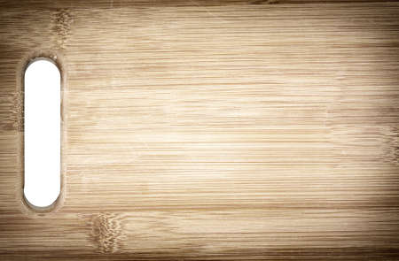 Cutting bamboo board used for cooking. Wood texture.の写真素材