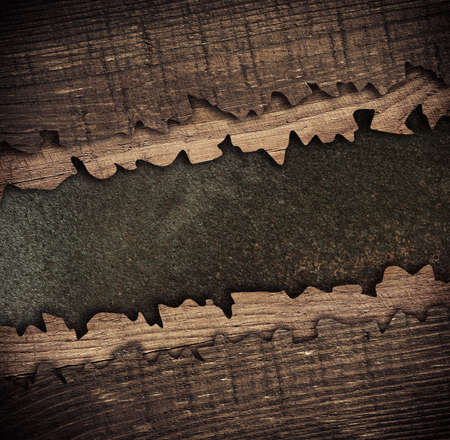 Composition of rusty metal plaque with copy space, name plate and old wooden planks.の写真素材