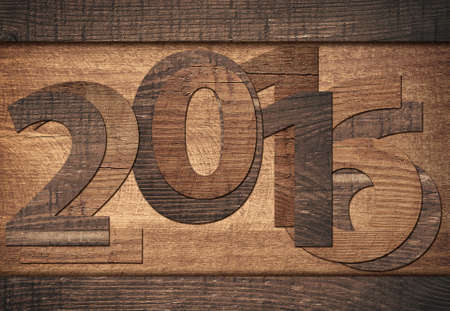 New twenty sixteen year  number written on wooden backgroundの写真素材