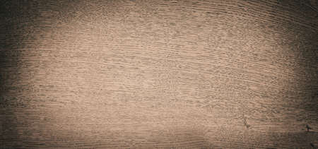 Grunge dark brown wooden wall texture, old pine plankの写真素材