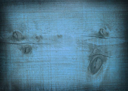 Dark blue scratched wooden plank. Wood texture.の写真素材