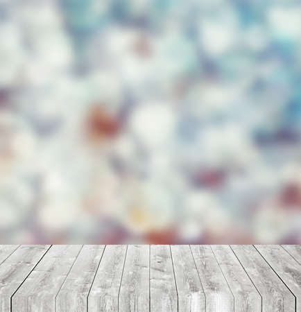Empty table and blurred litghts, bokeh background.
