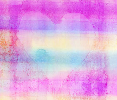 Heart shape painted on light abstract colorful watercolor background.の写真素材