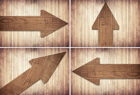 Set of dark brown wooden arrow are on wall.