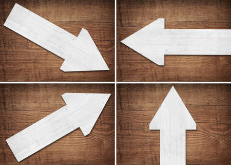 Set of white wooden arrow are on board.