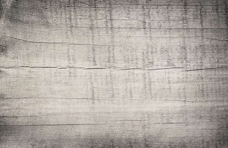Gray light scratched wooden cutting, chopping board. Wood texture.の写真素材