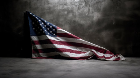 American flag on dark concrete with free spaceの素材