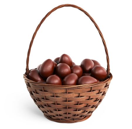 Basket filled chocolate eggs. Easter 3D, isolated on white backgroundの写真素材