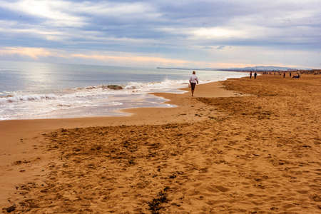 Beach of the Marina. Winter. The Marina, a beautiful and extensive beach of fine golden sand. Alicante Spain. Europe.の写真素材
