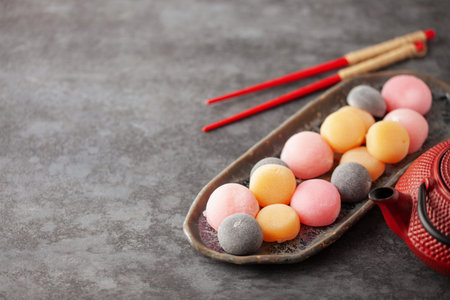 Japanese rice sweet dessert mochi in plate. Copy space