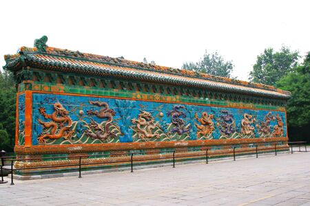 Famous Qing Dynasty 9 Dragon Wall in Central Beijingの写真素材