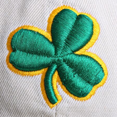 Silk Clover Shamrock on Textile Background