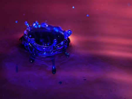 abstract background blue bright bubble  circle clean concept crown drop water macro stop freezeの写真素材