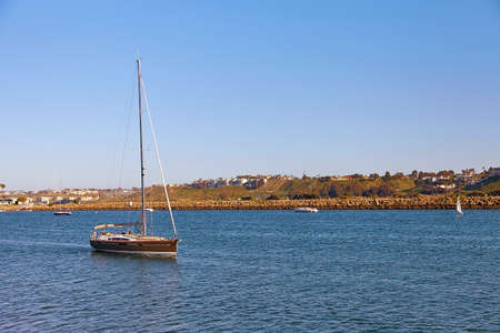 Sailboat back to the Marina Del Rey in California USAの写真素材